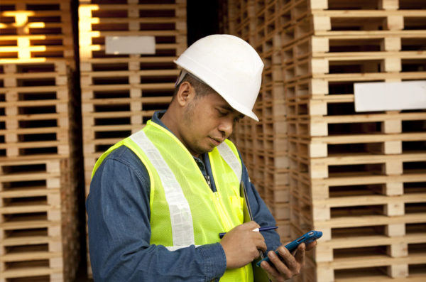 Workman-phone-white-helmet Workman-phone-white-helmet
